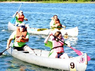 Two boats heading in
